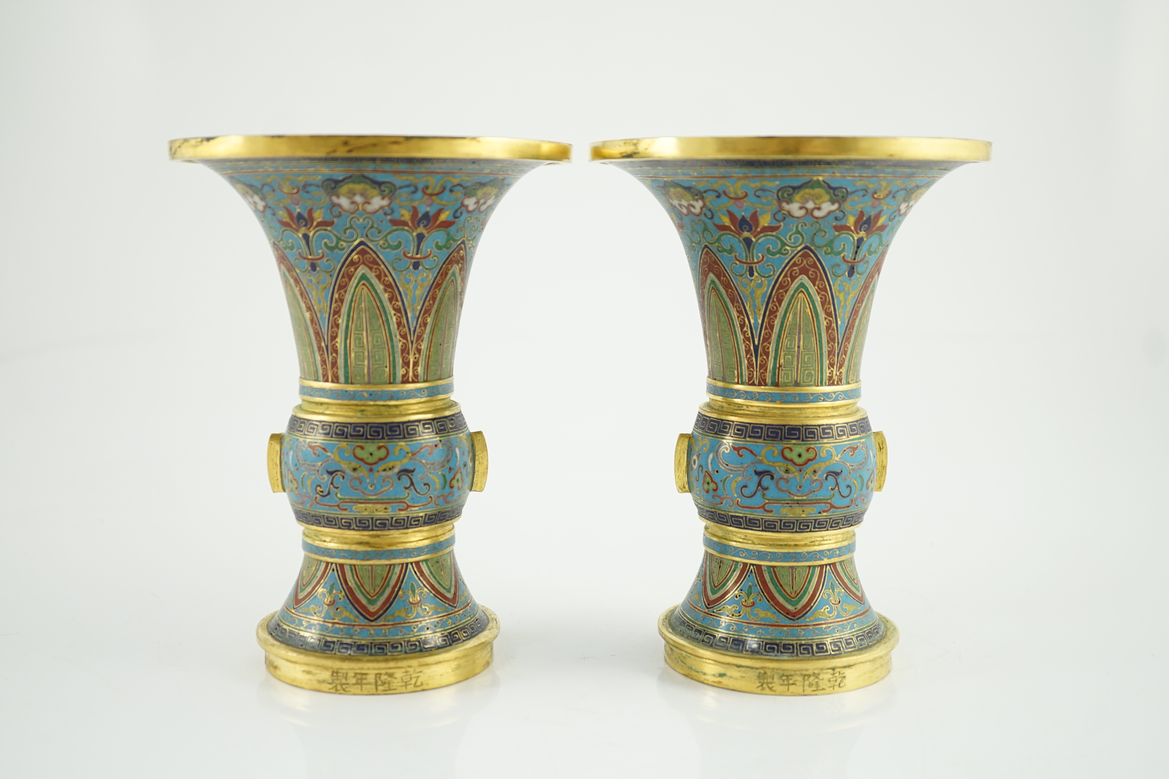 A pair of Chinese cloisonné enamel beaker vases